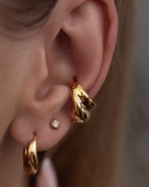 Złote kolczyki 316L o asymetrycznej, miękkiej formie